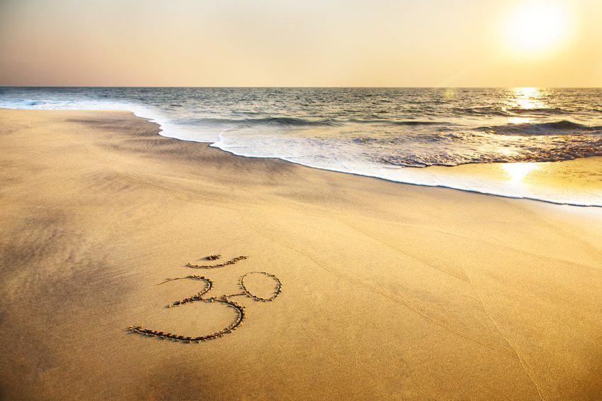 Stand med solnedgang